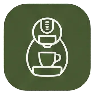 Cafetera de cápsulas Dolce Gusto en la cocina de la casa rural de Can Micos (Riudarenes, Girona), para disfrutar de café variado en grupo.