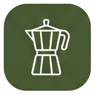 Cafetera italiana clásica disponible en la cocina de Can Micos, Riudarenes (Girona), ideal para desayunos de grupos grandes.