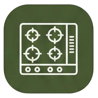 Encimera de 4 fuegos en la cocina de esta casa para grupos de vacaciones en Riudarenes, equipada para cocinar grandes cenas en Girona.